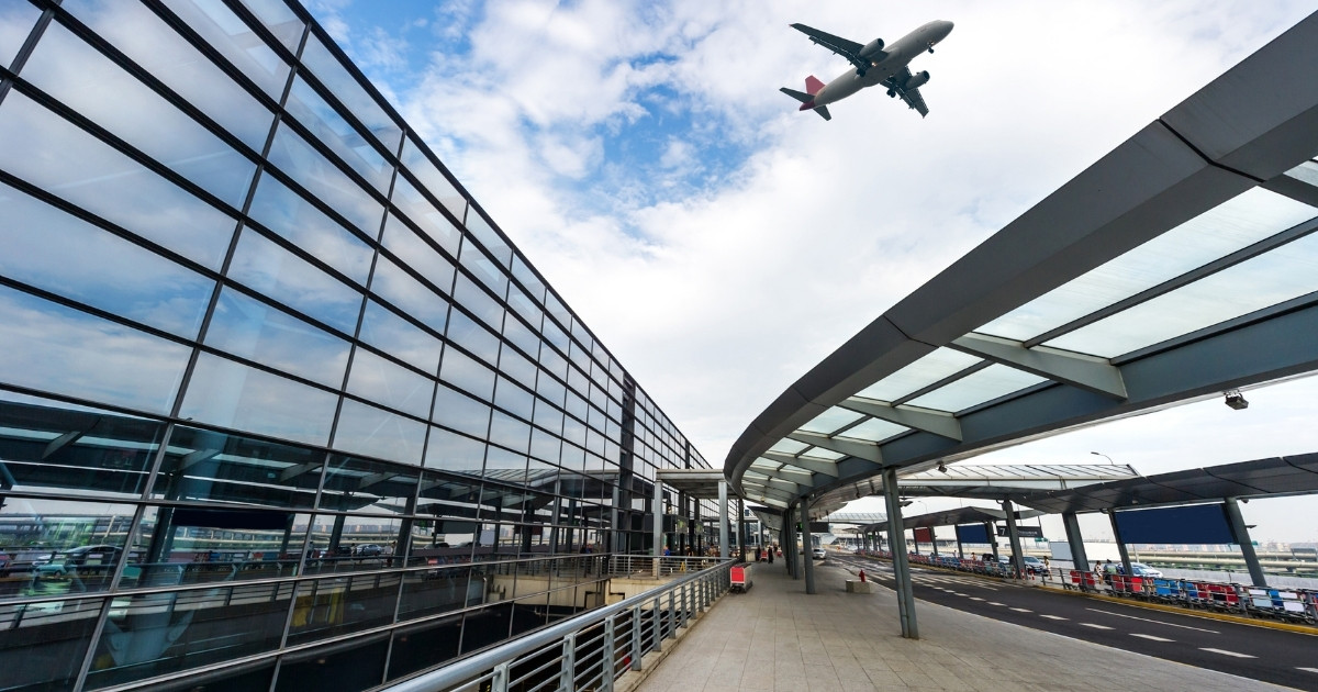 photo of a plane landing on the airport