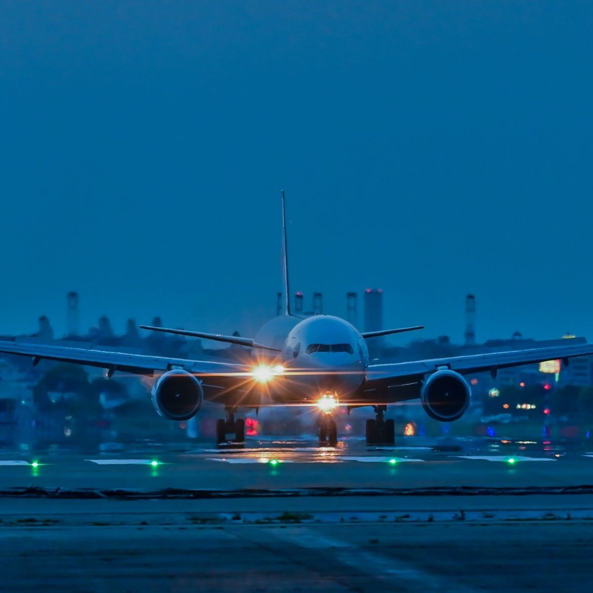 qrun-airport-transfer-bristol Bristol Airport terminal at dusk